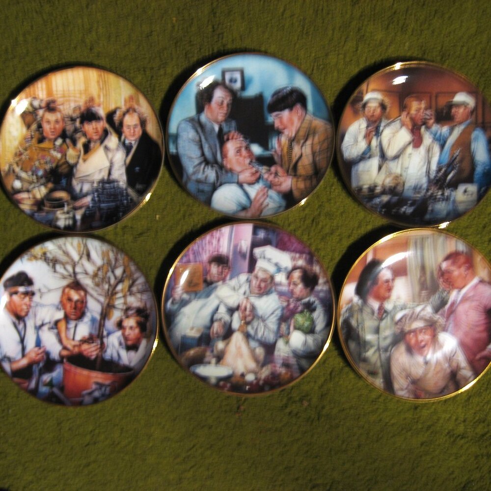The Three Stooges by the Franklin Mint 6 plate collection .